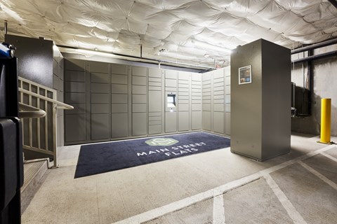 a locker room in a gym with a navy rug on the floor